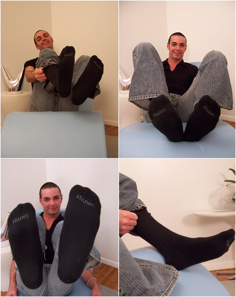 Amateur guy shows off his feet in black socks