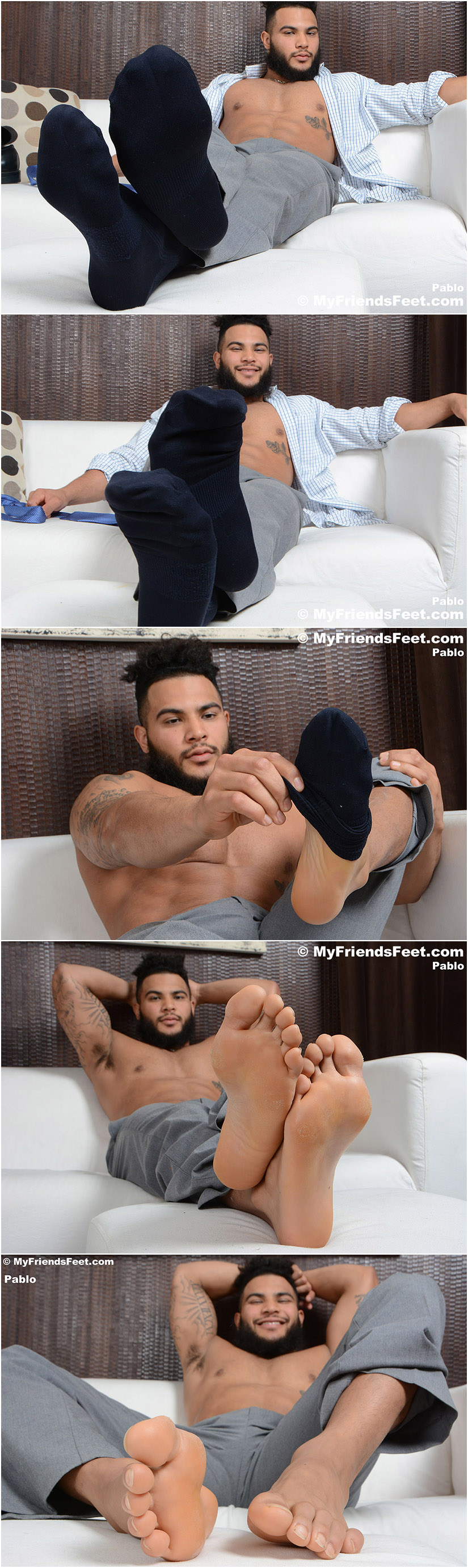 masculine hunk shows off his feet in black socks and bare